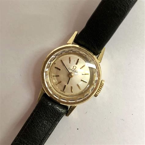 14k omega ladies watch.